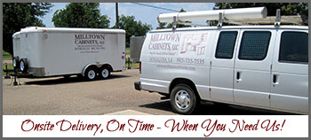 Photo of Milltown Cabinets van and cargo trailers for cabinet delivery